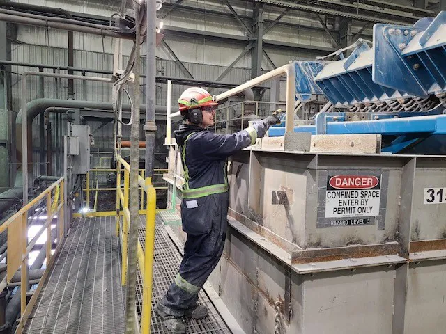 person working and pointing