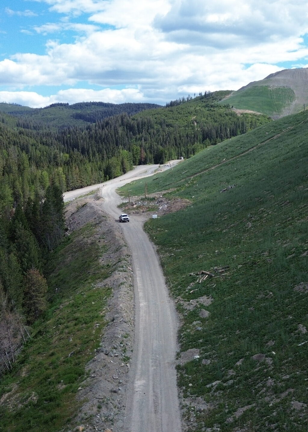 A light truck drives alongside a reclamation area at Hudbay's Copper Mountain mine in British Columbia.